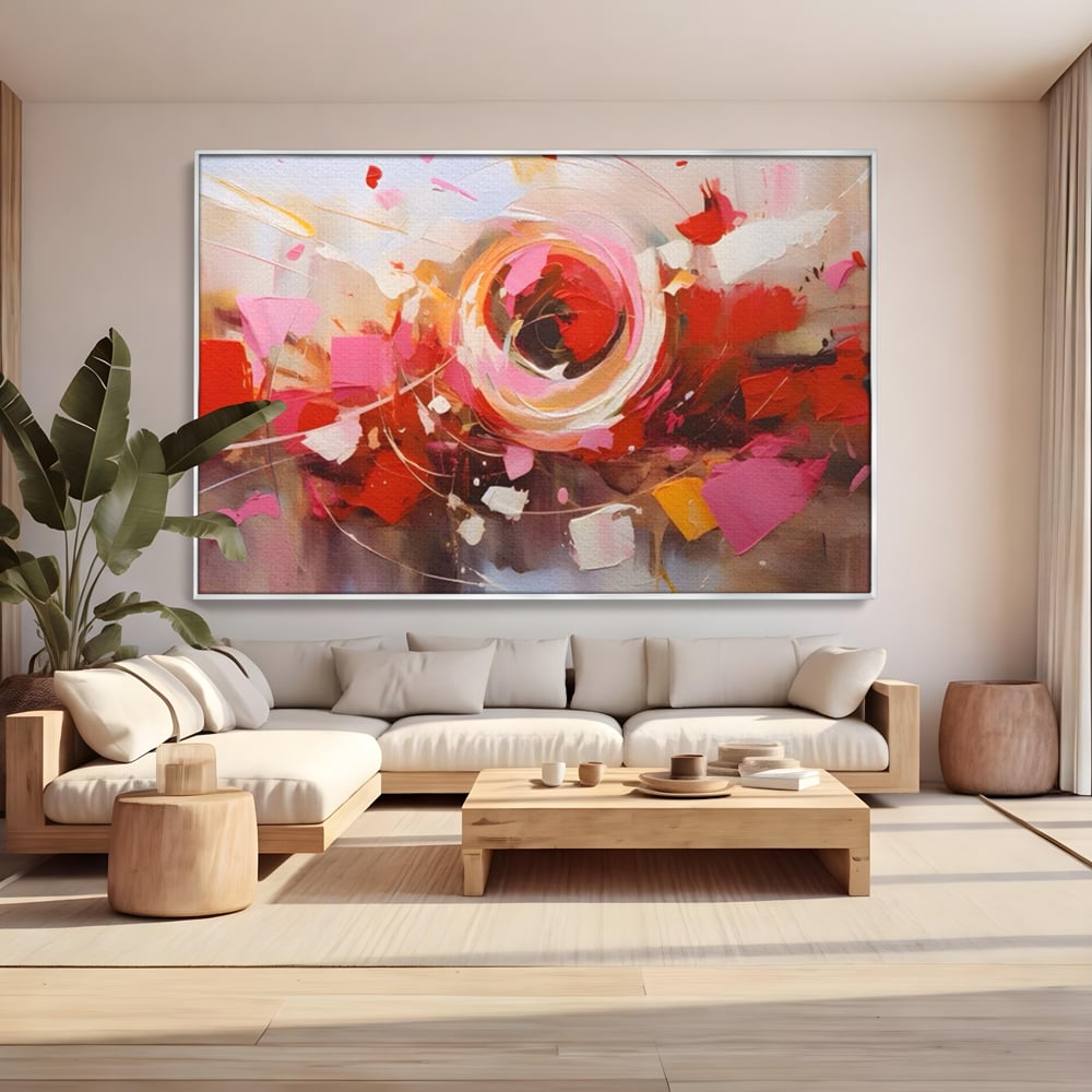 Tablou canvas cu tablou canvas cu floare abstracta si culori vibrante, in rama de aluminiu argintiu, pe perete intr-un living